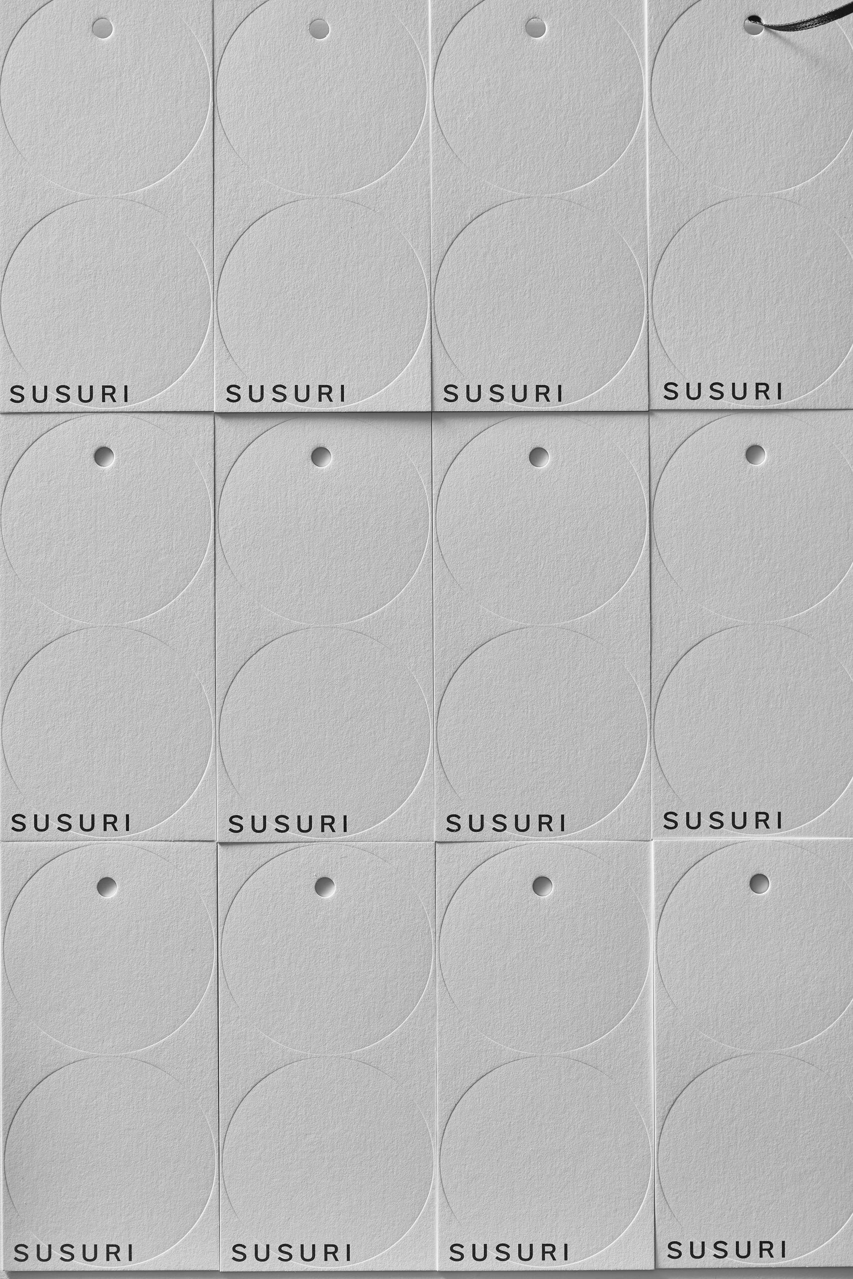 SUSURI paper cloth tags with blind embossed double circles